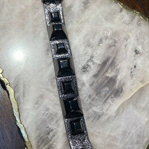 Designer leather spike cuff bracelet in gunmetal metallic